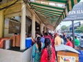 huge crowd outside lassiwala buttermilk shop in jaipur a popular tourist destination that serves this street food local