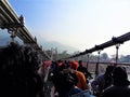 A Huge Crowd walking through a Lakshman Jhula Bridge, Rishikesh, India