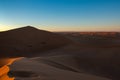 Huge desert dunes of Erg Chigaga, at the gates of the Sahara, al amanecer. Morocco. Concept of travel and adventure