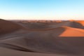 Huge desert dunes of Erg Chigaga, at the gates of the Sahara, al amanecer. Morocco. Concept of travel and adventure