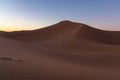 Huge desert dunes of Erg Chigaga, at the gates of the Sahara, al amanecer. Morocco. Concept of travel and adventure