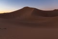 Huge desert dunes of Erg Chigaga, at the gates of the Sahara, al amanecer. Morocco. Concept of travel and adventure