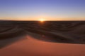 Huge desert dunes of Erg Chigaga, at the gates of the Sahara, at sunset. Morocco. Concept of travel and adventure