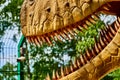 Huge dinosaur teeth in the mouth of a living Tirex. The robotic model is large in the frame, only the teeth of a