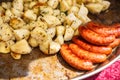 Huge Dish with fried potatoes sausages and barbecue. Street food