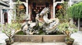 Huge dragon figure inside Chinese temple complex