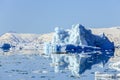 Huge drifting iceberg, view from old harbor in Nuuk city, Greenland