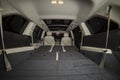 Huge empty car trunk in premium light color interior of suv. rear seats in premium car folded in flat flor. rear view