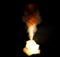 Huge, extremely hot explosion with sparks and hot smoke, against black background Royalty Free Stock Photo