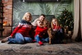 Huge family siiting on floor. Christmas time. Royalty Free Stock Photo