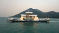 A huge ferry with people departs from the island. Royalty Free Stock Photo