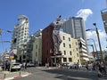 A huge figure of a cat in the cityscape in Tel Aviv