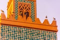 Huge flock of storks flying around the minaret of the kasbah mosque of Marrakech, Morocco