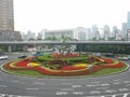 Ribbon shaped flowerbed,In the center of the road