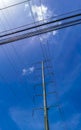 Huge gigantic power pole and cable blue sky clouds Mexico