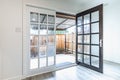 Huge glass door leading from the kitchen to the backyard