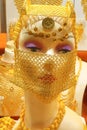 Huge gold jewelry mannequin face Dubai Gold Souk