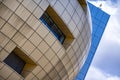 Huge golden ball or pumpkin, modern architecture