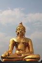 The huge Golden Buddha shines in the sun Royalty Free Stock Photo