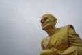 Huge golden Buddhist monk statue Royalty Free Stock Photo