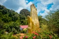 A huge golden hand on the territory of a Buddhist temple in Phatthalung in Thailand