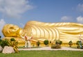 Huge golden sleeping Buddha with blue sky Royalty Free Stock Photo