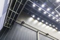 A huge hall the size of a building with a steel ceiling construction. Install illumination throughout a large space Royalty Free Stock Photo