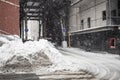 Huge heap of dirty snow and ice on a city street Royalty Free Stock Photo