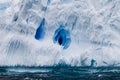 Huge iceberg floats in the turbulent waters surrounding Antarctica