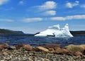 Iceberg Floating in Water on Sunny Day Royalty Free Stock Photo