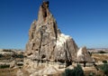 A huge iceberg-shaped mountain with many caves inside in the Rose Valley in Cappadocia, Turkey