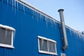 Huge icicles of ice hang from the roof of the building Royalty Free Stock Photo