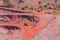 Huge iron ore quarry with working dump trucks and excavators in Kryvyi Rih, Ukraine Royalty Free Stock Photo