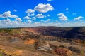 Huge iron ore quarry with working dump trucks and excavators in Kryvyi Rih, Ukraine Royalty Free Stock Photo