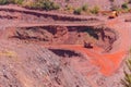 Huge iron ore quarry with working dump trucks and excavators in Kryvyi Rih, Ukraine Royalty Free Stock Photo