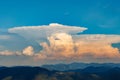 Clouds stretch across the blue sky above the valley of the Rhodope Mountains Royalty Free Stock Photo