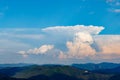 Clouds stretch across the blue sky above the valley of the Rhodope Mountains Royalty Free Stock Photo