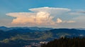 Clouds stretch across the blue sky above the valley of the Rhodope Mountains Royalty Free Stock Photo