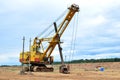 Huge mining excavator in the limestone open-pit.