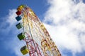 Huge modern colorful bright ferris wheel in an amusement park Royalty Free Stock Photo