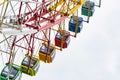 Amusement park observation wheel colored cabs Royalty Free Stock Photo