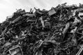 A huge mountain of metal pieces of different origin accumulated in a scrap yard Royalty Free Stock Photo