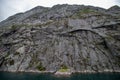 The huge mountain wall in Trollfjorden in Nordland county, Norway. Royalty Free Stock Photo