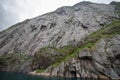 The huge mountain wall in Trollfjorden in Nordland county, Norway. Royalty Free Stock Photo