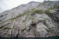 The huge mountain wall in Trollfjorden in Nordland county, Norway. Royalty Free Stock Photo