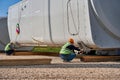 A huge multi-ton port crane lifts and unloads cargo