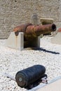 Valletta, Malta, August 2019. Old powerful cannon and her shell in a military museum. Royalty Free Stock Photo