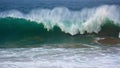 Huge ocean surf barrelling in super slow motion. Powerful wave rolling breaking Royalty Free Stock Photo