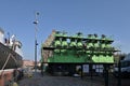 Beautiful panorama view of cityscape with huge green diesel ships engine in the Old Town in Gdansk