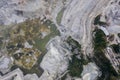 Huge open-pit granite quarry, view from drone, cloudy day